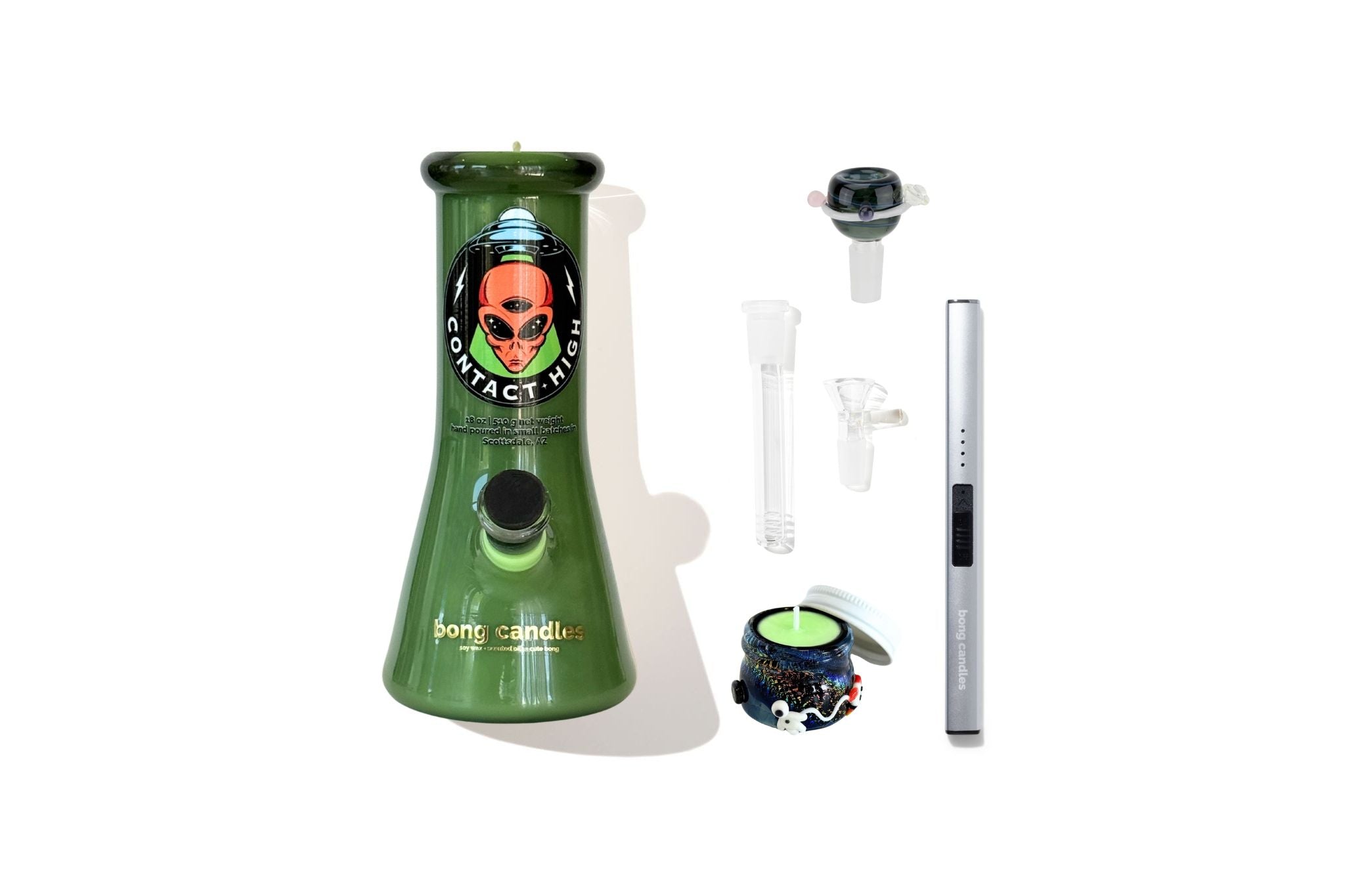 bong candles contact high, Green candle with alien design in front of a window showing UFOs over a cityscape.