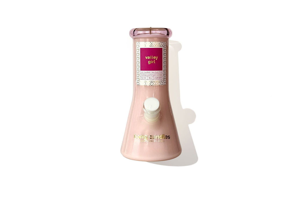 Pink valley girl bong candle with a label on a white background