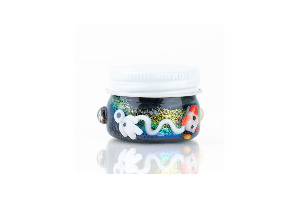 Decorative glass terp jar candle holder with colorful design on a white background
